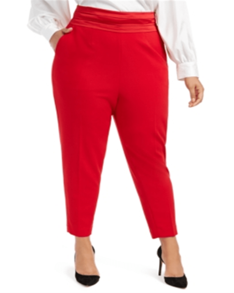 Front of a model wearing a size 16W Calvin Klein Women's Pleated Slim Leg Pants Red 16W in Red by Calvin Klein. | dia_product_style_image_id:307271